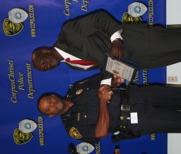 Chief Simpson presents Eric Enim with Citizen Certificate of Merit Chief Simpson presents Eric Enim with Citizen Certificate of Merit