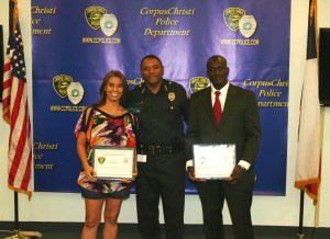 Chief Simpson Eric Enim and Jennifer Martinez Chief Simpson presents Eric Enim and Jennifer Martinez with Citizen Certificates of Merit