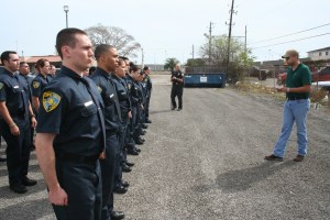 Officer Eric Garza and Senior Officer James Morales instruct the cadets in Drill and Ceremony