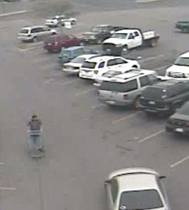 Police Would like to identify and speak to this man who returned the cart and checkbook to Wal-Mart staff on February 21, 2013.