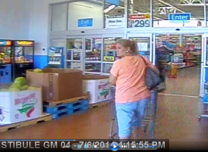 Suspect turning to see if anybody is coming or sees her