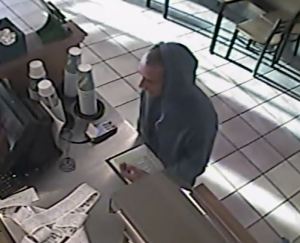 Detectives have asked the public to help identifty this robbery suspect